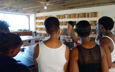 South African women viewing a presentation about Project EMOTION