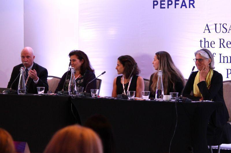 A panel of speakers at a U.S. President's Emergency Plan for AIDS Relief conference.